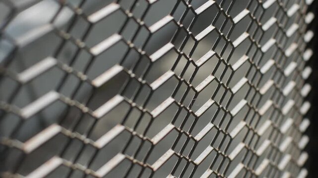 Rusty Chain Link Fence Mesh in Diagonal Perspective with Sunlight