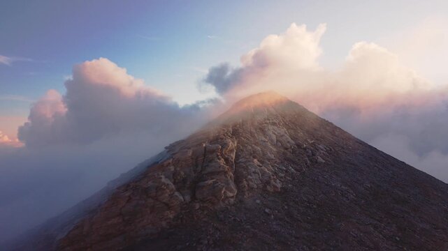 Aerial View of Profitis Ilias Peak Chapel on Mount Olympus Above the Clouds at Sunset