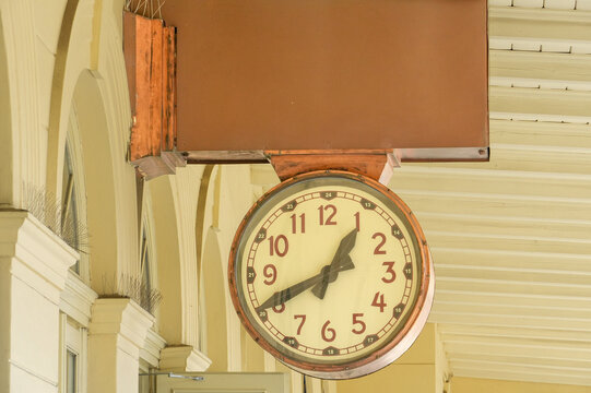 clock on the wall of the old building, closeup of photo