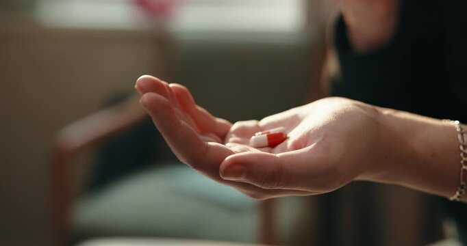 Healthcare, pills and hands with antibiotics in home, prescription or medical medicine for recovery. Wellness, treatment and person with tablets, pharmaceutical drugs and healing with supplements