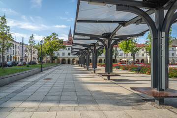 Old Market Square in Łódź with Modern Architecture and Blooming Flower Beds on a Sunny Day © Senatorek