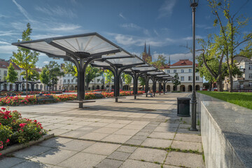 Old Market Square in Łódź with Modern Architecture and Blooming Flower Beds on a Sunny Day © Senatorek