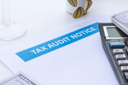 Tax Audit Notice Document on Office Desk with Notebook and Pen