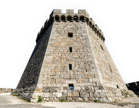 Rare triangular medieval stone outpost tower isolated on white for strategic defense concepts