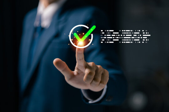 Digital verification interface with approved checkmark selected by a business professional, representing validation, authentication, compliance, quality assurance, workflow approval.