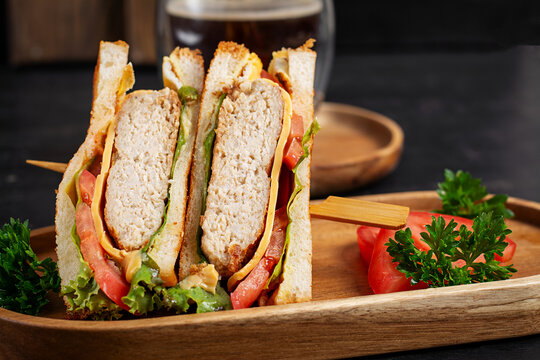 Fresh Chicken Club Sandwich Served on Dark Background
