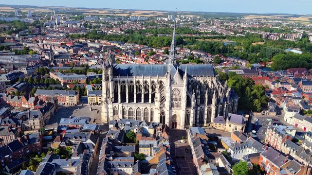 Amiens Cathedral is a 13th-century High Gothic UNESCO World Heritage site in France, renowned for its massive interior volume, soaring spire, and intricate flying buttresses dominating the city.