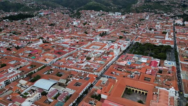 Panoramic drone view of Sucre, the famous white city of Bolivia, showing historic landmarks.
