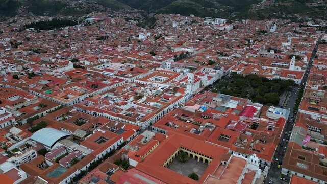 Breathtaking aerial drone footage of Sucre's historic center with colonial rooftops and cathedral.