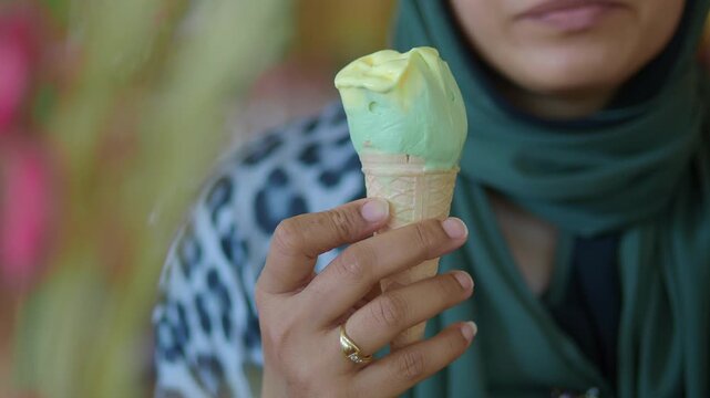 Enjoying ice cream at a local shop during warm afternoon