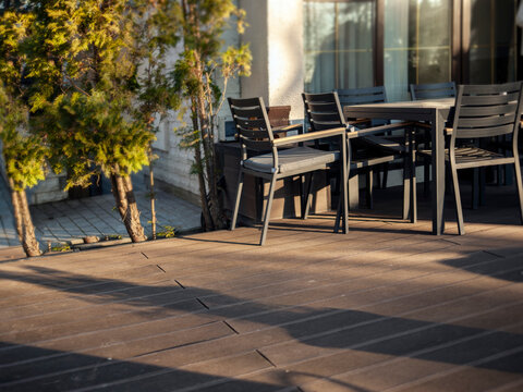 garden furniture and shade from junipers