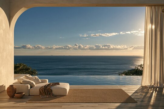 Outdoor luxury lounge with infinity pool and ocean view sunset