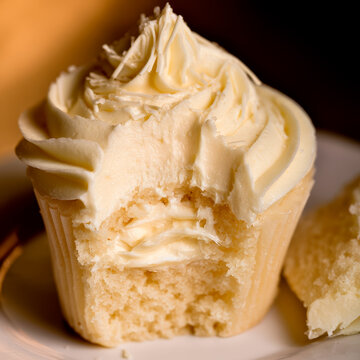 Vanilla Coconut Cupcake on a Plate. Generative AI