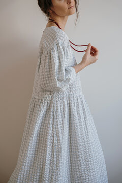 Model in Casual Checkered Dress