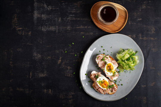 Protein Rich Breakfast with Tuna Sandwiches and Fresh Vegetables. Top view
