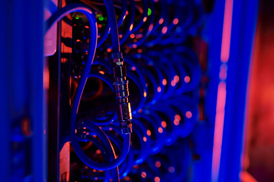 Computer cables attached together in server room