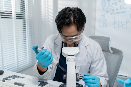 Scientists perform laboratory research using microscopes, test tubes, and modern scientific equipment to analyze samples, representing biotechnology, healthcare, diagnostics, and medical innovation.