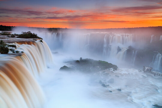 South America, Argentina, Brazil, Iguazu National Park, Iguazu Falls at sunset