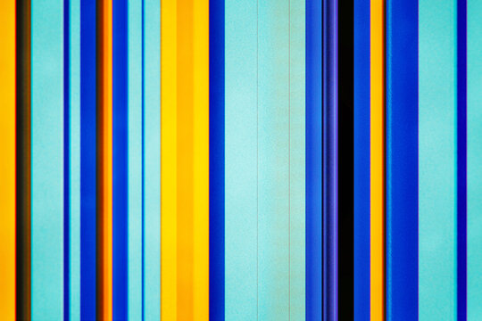 Abstract colorful vertical stripes with glitched grain texture