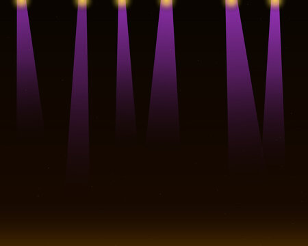Bright purple stage spotlights shining down in a dark room creating a dramatic atmosphere for a concert or a performance event