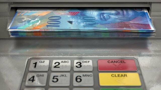 Cash withdrawal from ATM machine with hand taking swiss franc banknotes from automated teller in 4K Ultra HD footage
