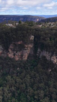 Aerial View of Sandstone Cliffs and Eucalyptus Forest in Blue Mountains