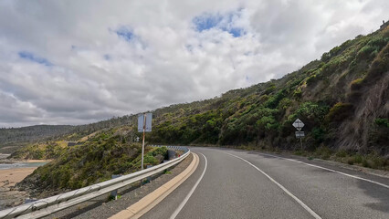 Obraz premium Winding Coastal Road Along the Great Ocean Road in Australia