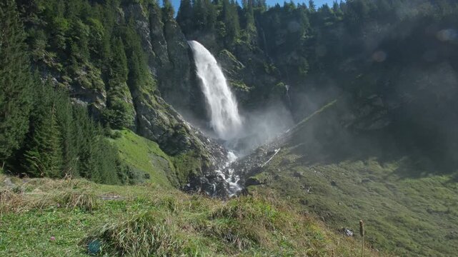 Staeubenfall Waterfall in the Swiss Alps, Uri, Switzerland. Staeubenfall Waterfall in Swiss Alps. Staubenfall Waterfall in Isenthal Valley, Uri, Switzerland