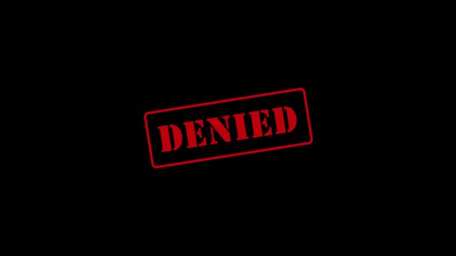 Animation of a red stamp with the text "denied" being stamped onto a black screen; 4K video.