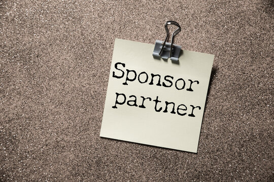 white paper sign with sponsor partner message