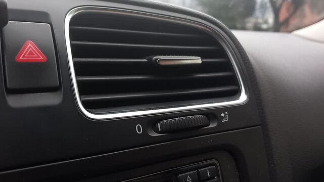 Central car heater fan whirring quickly while engine idles, capturing sounds of airflow inside a vehicle