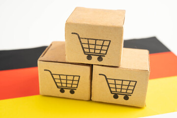 Germany flag with Shopping cart box, import export, finance commerce. © kanruthai