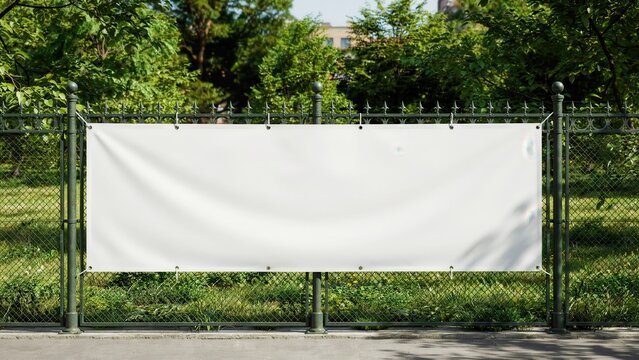 Mockup blank white vinyl banner hanging on a metal fence