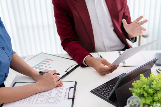 Business administrator analyzing company marketing and sales performance to boost business growth in office environment