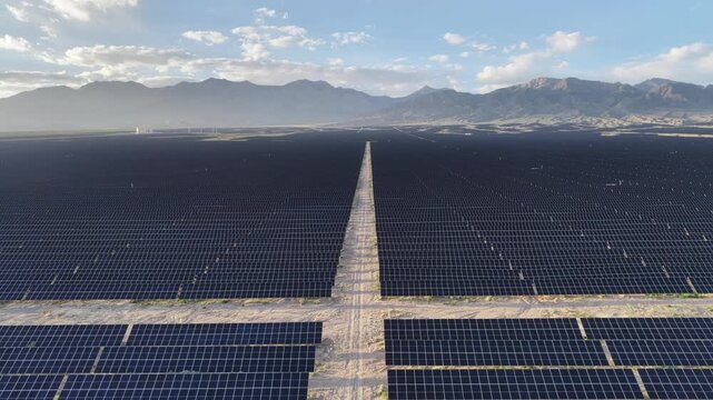 Aerial View of Utility-Scale Solar Farm with Battery Energy Storage System in Arid Desert