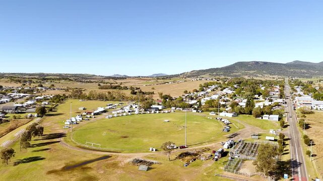 Drone footage of the showgrounds in Kalbar panning to the township