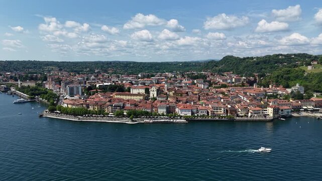 Aerial Dolly In Panorama Arona City Waterfront on Lake Maggiore