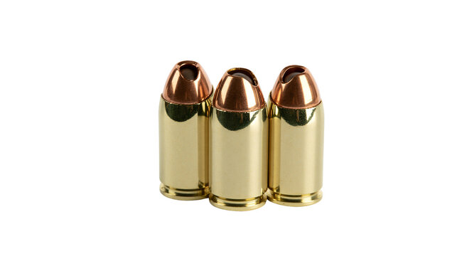 Three brass bullets with copper tips, isolated on transparent background