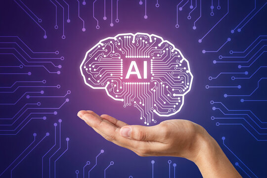 Human hand holding brain with circuit board and AI letter, artificial intelligence concept.