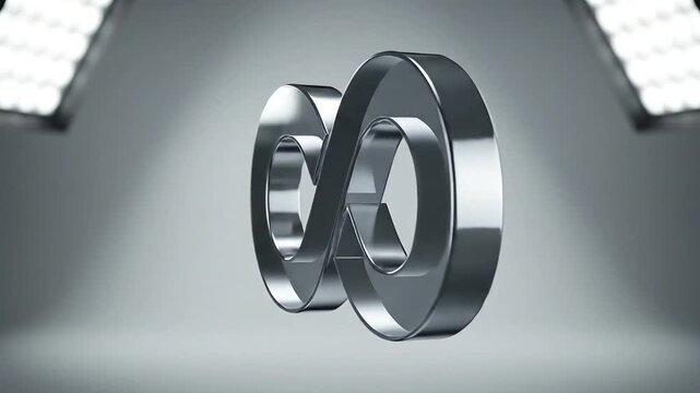 Infinite Possibilities: A sleek, metallic infinity symbol illuminated by studio lights, representing endless opportunities and conceptual thinking.
