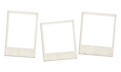 Three old vintage polaroid frames scattered on transparent background for web project. © riazul