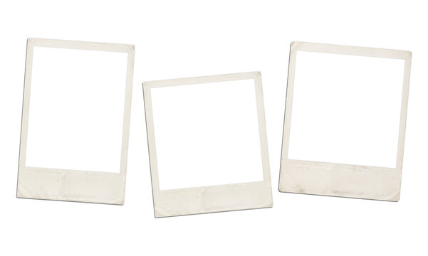 Three old vintage polaroid frames scattered on transparent background for web project.