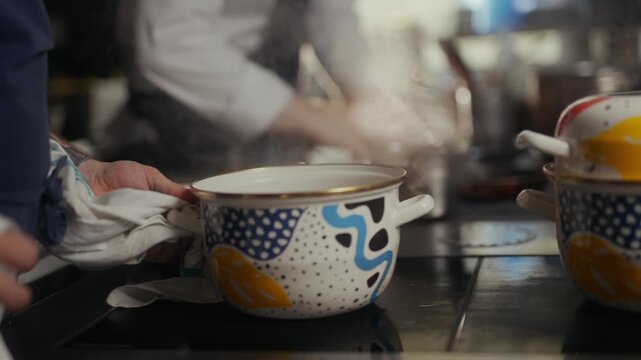 Colorful ceramic bowls on a kitchen counter during food preparation