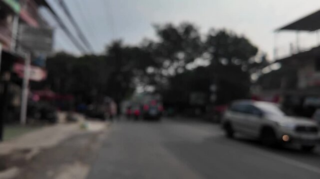 blurry time lapse of people walking in the city