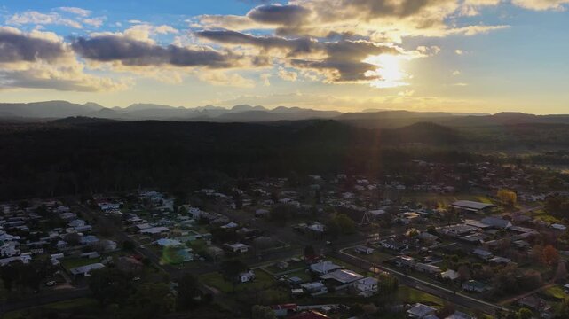 Aerial Sunset View Over Coonabarabran Outback Town and Mountains