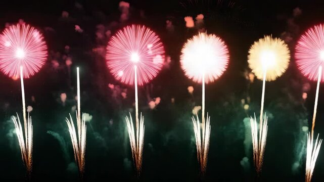 A stunning nighttime scene of a fireworks show in full swing with vibrant colors and patterns against the dark sky.