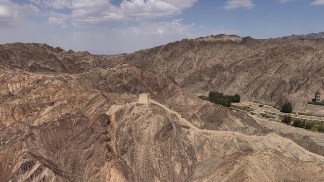 Ancient Chinese Great Wall Watchtower and Fortification on Rugged Mountains in Gansu Province, Northwest China
