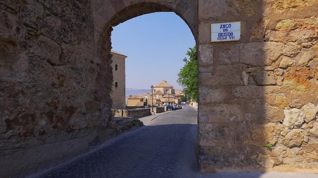 Arco de Bezudo framing the historic old town beside Cuenca Castle in Cuenca Spain