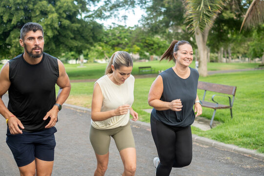 People jogging together in the park