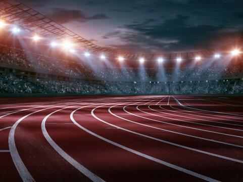 Running track in stadium with white lane marking and deep perspective under bright floodlight at night